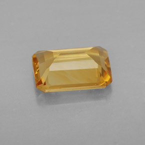 1.69カラットの天然ゴールデンイエローシトリン（9×7 mm・エメラルドカット）