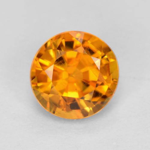 0.48カラットの天然アプリコットオレンジクリノヒューマイト（4.84 mm・ラウンドカット）