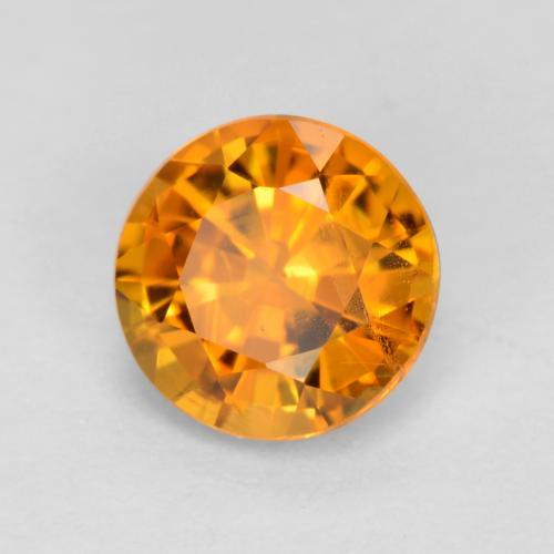0.48カラットの天然アプリコットオレンジクリノヒューマイト（4.84 mm・ラウンドカット）
