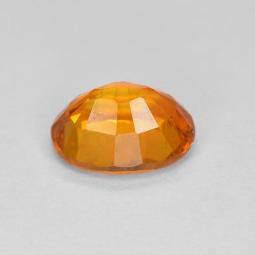 1.38カラットの天然ミディアムオレンジクリノヒューマイト（7.7×6 mm・オーバルカット）