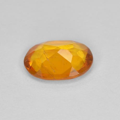 1.00カラットの天然アンバーオレンジクリノヒューマイト（8×6 mm・オーバルカット）
