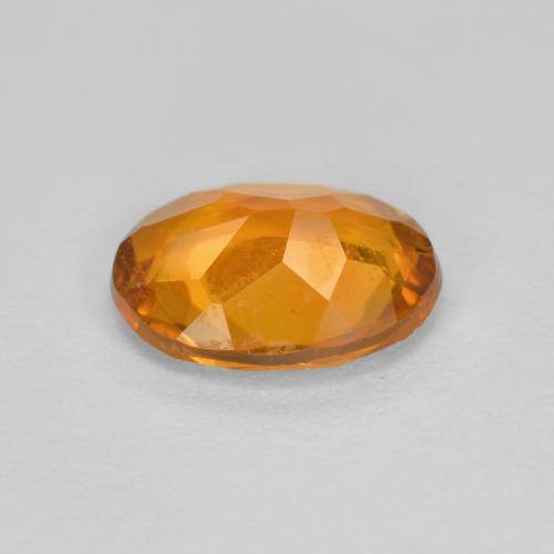 1.34カラットの天然鮮やかなオレンジクリノヒューマイト（8.6×6.6 mm・オーバルカット）