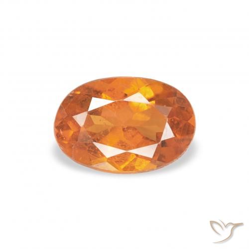 0.57ct 天然 ミディアムオレンジ クリノヒューマイト, 楕円形, SI