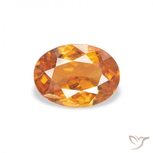 0.70ct 天然 アプリコットオレンジ クリノヒューマイト, 楕円形, SI