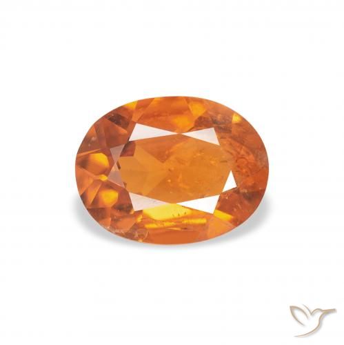 1.04ct 天然 アンバーオレンジ クリノヒューマイト, 楕円形, SI
