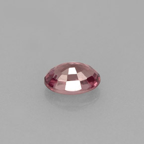 0.61カラットの天然ピンクがかったローズ〜オレンジカラーチェンジガーネット（5.8×4 mm・オーバルカット）