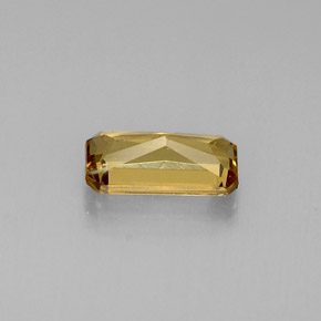 0.74カラットの天然緑がかった茶〜レッドピンクカラーチェンジガーネット（7.1×3.5 mm・エメラルドカット）