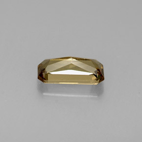 0.67カラットの天然緑がかった茶〜レッドピンクカラーチェンジガーネット（7×3.5 mm・エメラルドカット）