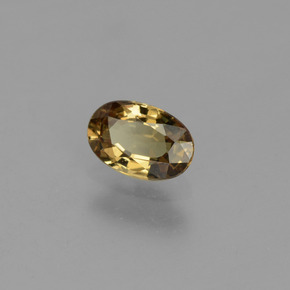 0.56カラットの天然緑がかった茶〜レッドピンクカラーチェンジガーネット（6.1×4.1 mm・オーバルカット）
