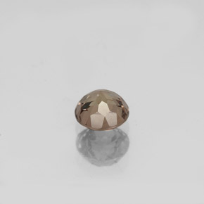0.75カラットの天然茶色がかったローズ〜レッドカラーチェンジガーネット（5.04 mm・ラウンドカット）