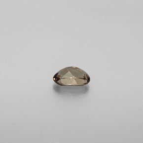 0.60カラットの天然ゴールドブラウンからオレンジカラーチェンジガーネット、オーバルカット、VS