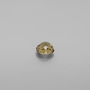 0.51カラットの天然ゴールドブラウンからオレンジカラーチェンジガーネット、ラウンドカット、VS