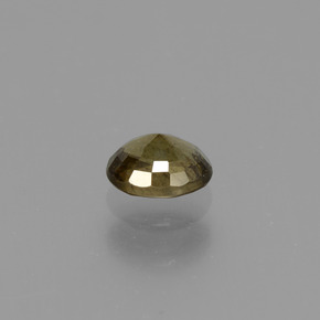 0.66カラットの天然ゴールデンイエローカラーチェンジガーネット（5.5×4.6 mm・オーバルカット）