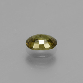 0.73カラットの天然緑がかった茶〜レッドピンクカラーチェンジガーネット（6.2×4.6 mm・オーバルカット）