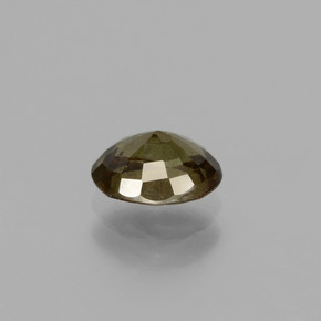 0.89カラットの天然ダークブラウンカラーチェンジガーネット（6.4×4.8 mm・オーバルカット）