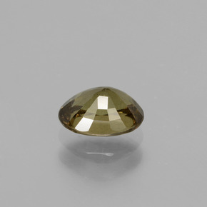 0.94カラットの天然緑がかった茶〜レッドピンクカラーチェンジガーネット（6.5×4.8 mm・オーバルカット）