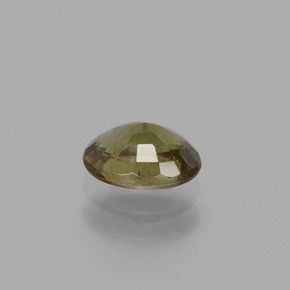 0.85カラットの天然アンバーブラウンカラーチェンジガーネット（6.4×4.8 mm・オーバルカット）