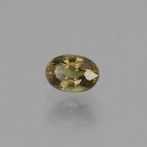 0.75カラットの天然緑がかった茶〜レッドピンクカラーチェンジガーネット（6×4.2 mm・オーバルカット）