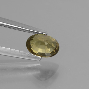 0.75カラットの天然緑がかった茶〜レッドピンクカラーチェンジガーネット（6×4.2 mm・オーバルカット）