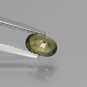 0.62カラットの天然緑がかった茶〜レッドピンクカラーチェンジガーネット（6×4.1 mm・オーバルカット）