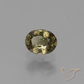 0.87カラットの天然アンバーブラウンカラーチェンジガーネット（6.1×4.8 mm・オーバルカット）