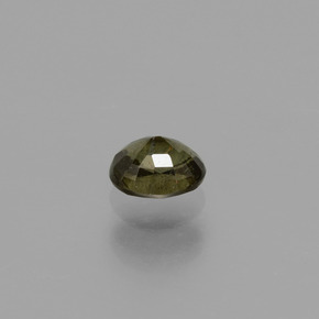 0.53カラットの天然緑がかった茶〜レッドピンクカラーチェンジガーネット（5×4 mm・オーバルカット）
