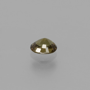 0.66カラットの天然グリーンからレッドピンクカラーチェンジガーネット、オーバルカット、VS