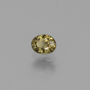 0.62カラットの天然グリーンからレッドピンクカラーチェンジガーネット、オーバルカット、VS