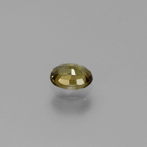0.57カラットの天然グリーン〜レッドピンクカラーチェンジガーネット（5.4×4.4 mm・オーバルカット）