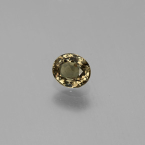 0.53カラットの天然グリーンからレッドピンクカラーチェンジガーネット、オーバルカット、VS