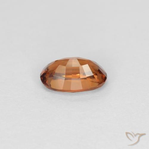 0.60カラットの天然ダークブラウンカラーチェンジガーネット（6×4 mm・オーバルカット）