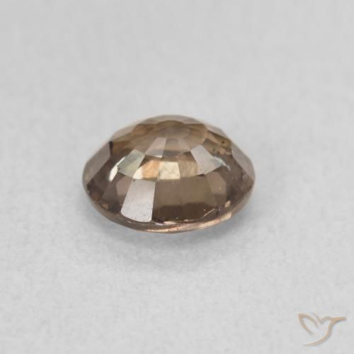0.90カラットの天然ダークブラウンカラーチェンジガーネット（5.76 mm・ラウンドカット）