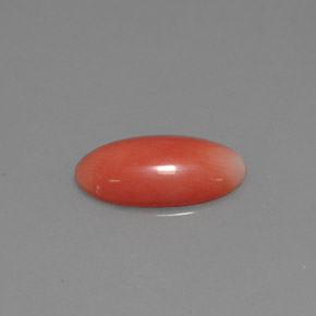 1.69カラットの天然サーモンサンゴ（12.8×6.6 mm・オーバルカット）