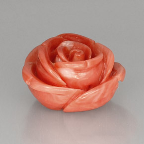 21.52カラットの天然サーモンサンゴ、ファンシーシェイプ、オペーク