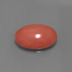 5.26カラットの天然サーモンサンゴ（14.9×11 mm・オーバルカット）