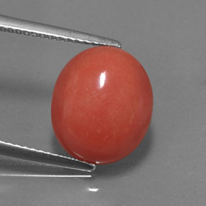 4.34カラットの天然サーモンサンゴ（12.8×10.8 mm・オーバルカット）