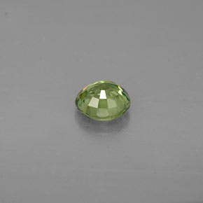0.47カラットの天然ゴールデングリーンデマントイドガーネット（4.55 mm・ラウンドカット）