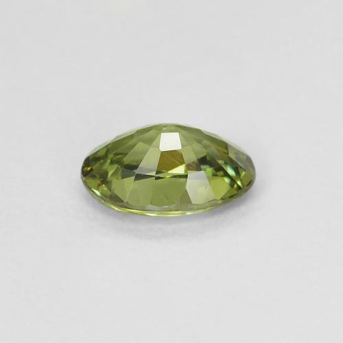 0.58カラットの天然ミディアムグリーンデマントイドガーネット（6×4.2 mm・オーバルカット）