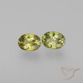 Shop natural 0.65ct 緑ががかったイエロー デマントイドガーネット gems, 楕円形, from ナミビア at GemSelect. In stock, global shipping!