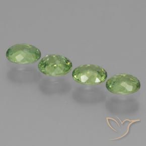 Shop natural 1.24ct ミディアムグリーン デマントイドガーネット gems, 楕円形, from ナミビア at GemSelect. In stock, global shipping!