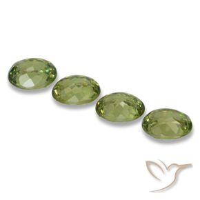 Shop natural 1.23ct オリーブグリーン デマントイドガーネット gems, 楕円形, from ナミビア at GemSelect. In stock, global shipping!