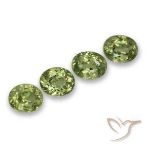 Shop natural 1.70ct 薄いフォレストグリーン デマントイドガーネット gems, 楕円形, from ナミビア at GemSelect. In stock, global shipping!