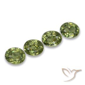 Shop natural 1.57ct 薄いフォレストグリーン デマントイドガーネット gems, 楕円形, from ナミビア at GemSelect. In stock, global shipping!
