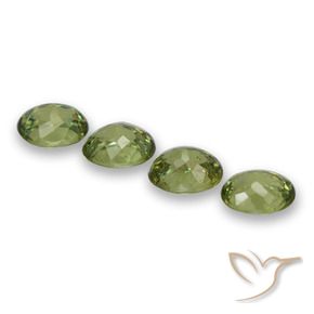 Shop natural 1.57ct 薄いフォレストグリーン デマントイドガーネット gems, 楕円形, from ナミビア at GemSelect. In stock, global shipping!