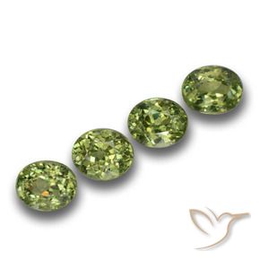 Shop natural 1.40ct 薄いフォレストグリーン デマントイドガーネット gems, 楕円形, from ナミビア at GemSelect. In stock, global shipping!