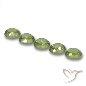 Shop natural 1.91ct 薄いフォレストグリーン デマントイドガーネット gems, 楕円形, from ナミビア at GemSelect. In stock, global shipping!