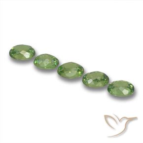 Shop natural 1.57ct ミディアムグリーン デマントイドガーネット gems, 楕円形, from ナミビア at GemSelect. In stock, global shipping!