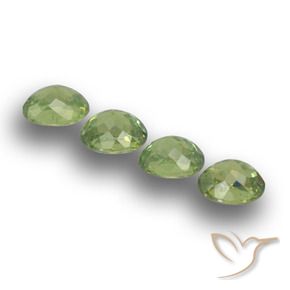 Shop natural 1.40ct ミディアムグリーン デマントイドガーネット gems, 楕円形, from ナミビア at GemSelect. In stock, global shipping!