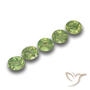 Shop natural 1.61ct イエローグリーン デマントイドガーネット gems, 楕円形, from ナミビア at GemSelect. In stock, global shipping!