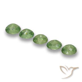 Shop natural 1.73ct フォレストグリーン デマントイドガーネット gems, 楕円形, from ナミビア at GemSelect. In stock, global shipping!